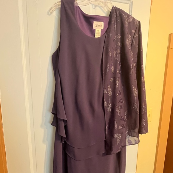 Dress is sleeveless has a light sheer jacket the has sparkly swirls. - Picture 2 of 2